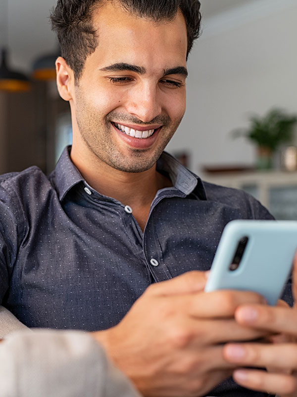A man looking at his cellphone