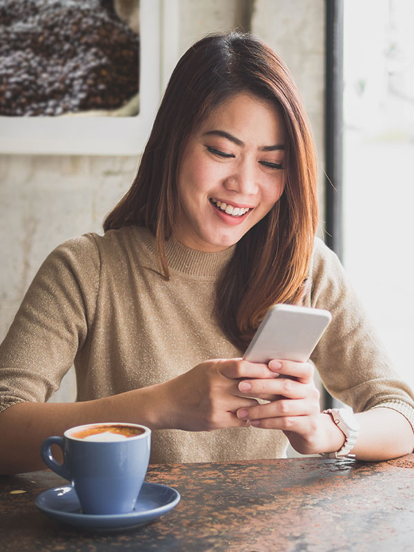 A woman using her mobile phone
