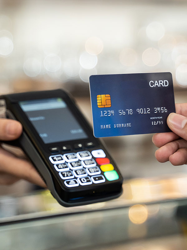 Someone paying by tapping their card